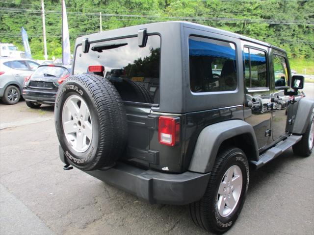 used 2011 Jeep Wrangler Unlimited car, priced at $11,900