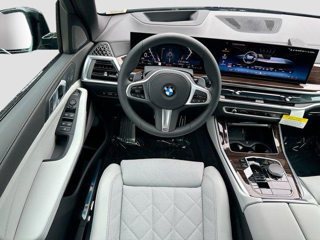 new 2026 BMW X5 car, priced at $84,075