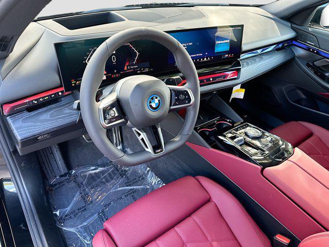 new 2026 BMW 550e car, priced at $82,950