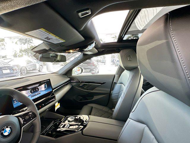 new 2025 BMW 530 car, priced at $63,695