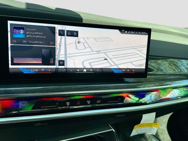 new 2025 BMW 740 car, priced at $118,425