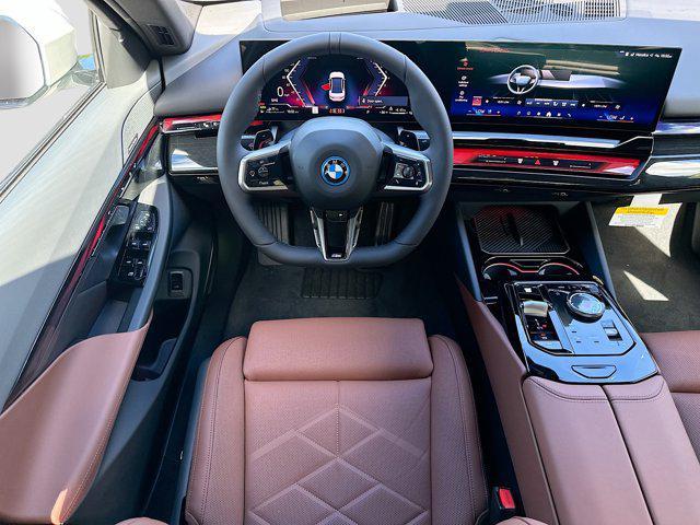 new 2026 BMW 550e car, priced at $86,250