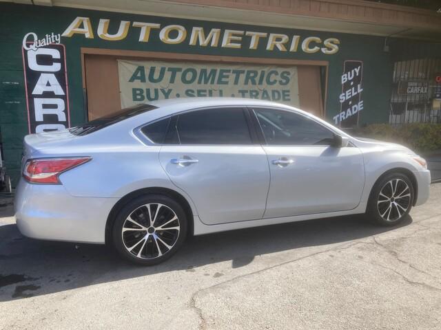 used 2015 Nissan Altima car, priced at $9,999