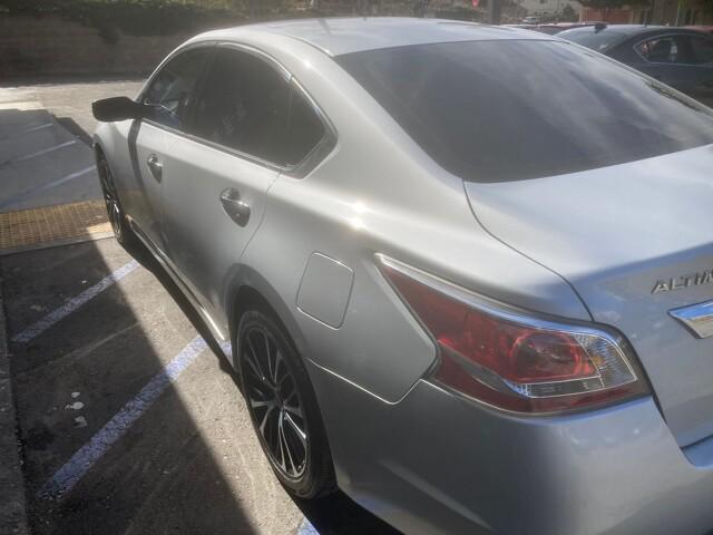 used 2015 Nissan Altima car, priced at $9,999