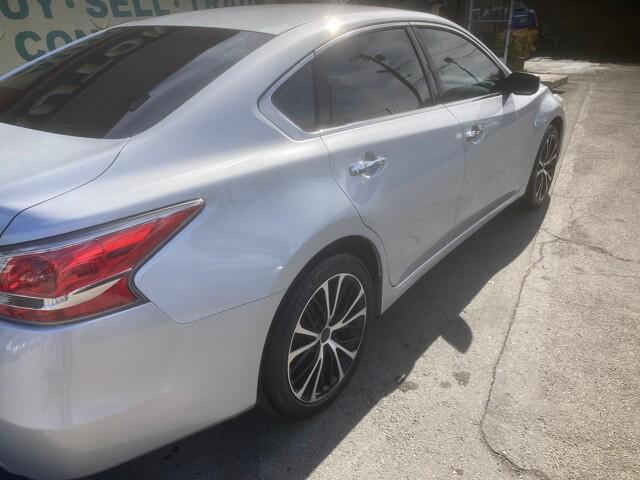 used 2015 Nissan Altima car, priced at $9,999