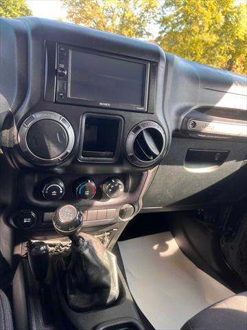 used 2014 Jeep Wrangler car, priced at $15,975