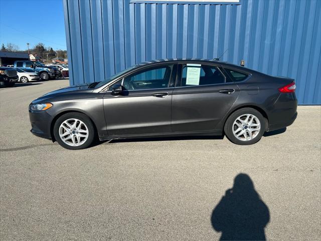 used 2016 Ford Fusion car, priced at $11,978