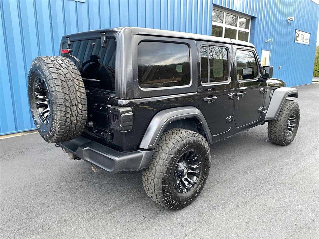 used 2021 Jeep Wrangler Unlimited car, priced at $25,991