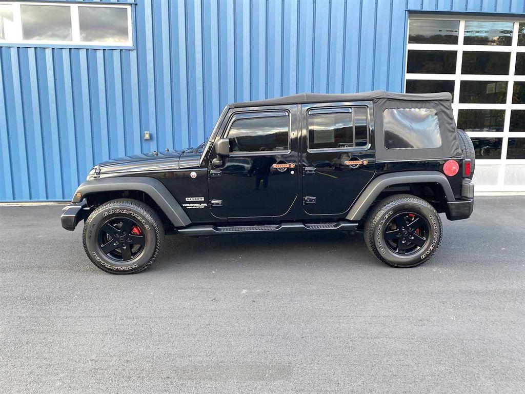 used 2014 Jeep Wrangler Unlimited car, priced at $16,533