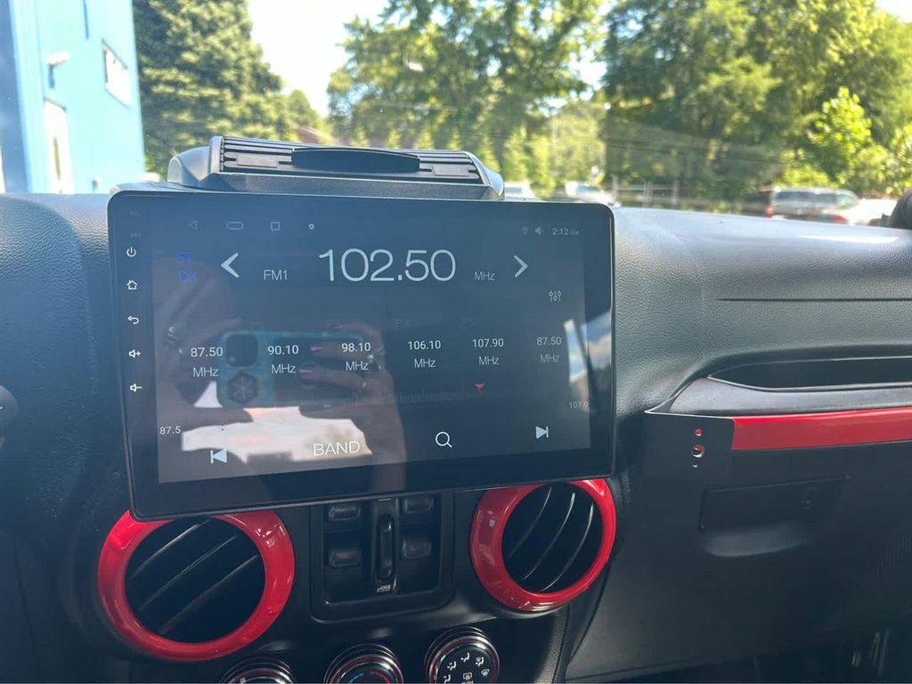 used 2014 Jeep Wrangler Unlimited car, priced at $16,533