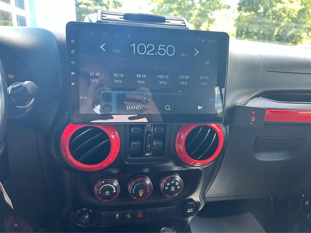 used 2014 Jeep Wrangler Unlimited car, priced at $16,533