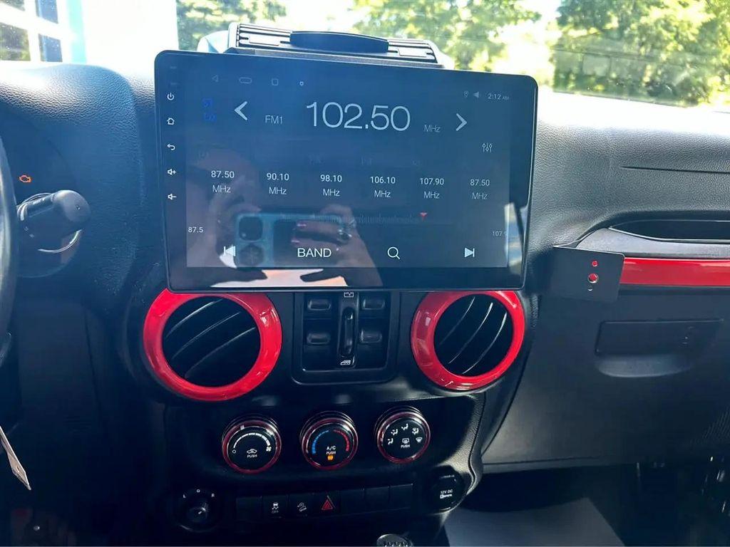 used 2014 Jeep Wrangler Unlimited car, priced at $17,970