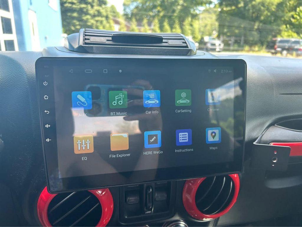 used 2014 Jeep Wrangler Unlimited car, priced at $16,533