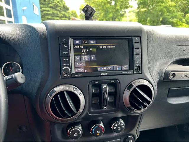 used 2018 Jeep Wrangler JK Unlimited car, priced at $23,975