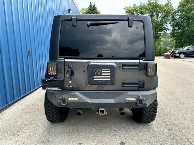 used 2018 Jeep Wrangler JK Unlimited car, priced at $23,975