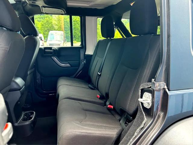 used 2018 Jeep Wrangler JK Unlimited car, priced at $23,975