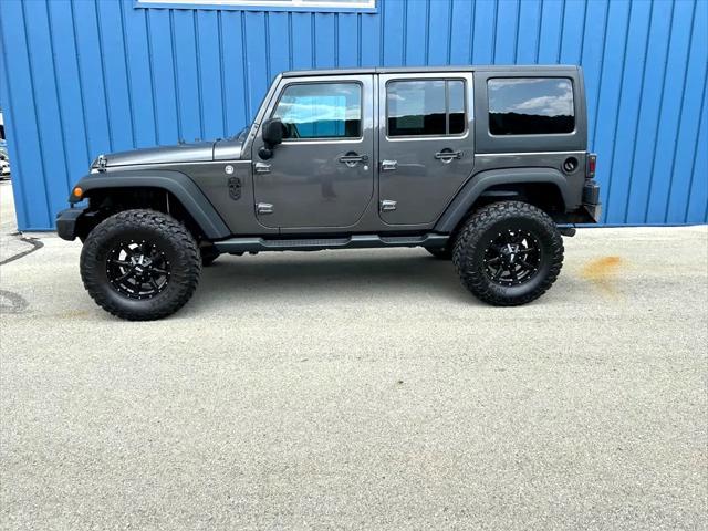used 2018 Jeep Wrangler JK Unlimited car, priced at $23,975