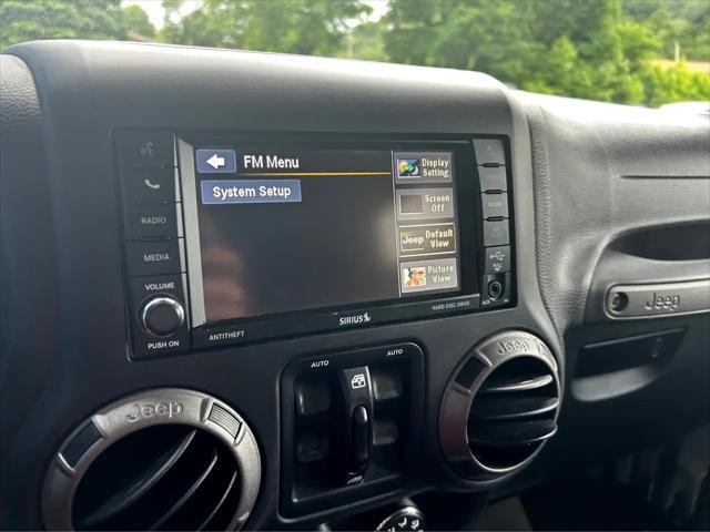 used 2016 Jeep Wrangler Unlimited car, priced at $18,950