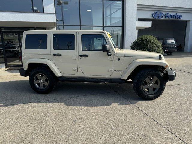 used 2011 Jeep Wrangler Unlimited car, priced at $10,950