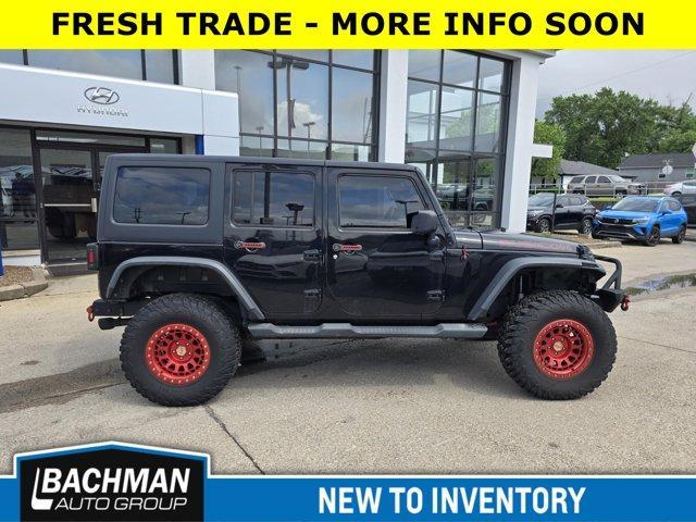 used 2013 Jeep Wrangler Unlimited car, priced at $16,500