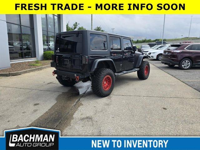 used 2013 Jeep Wrangler Unlimited car, priced at $16,500