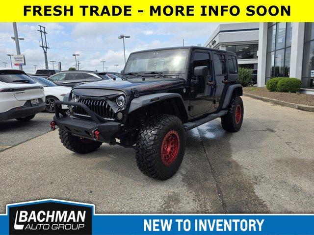 used 2013 Jeep Wrangler Unlimited car, priced at $16,500