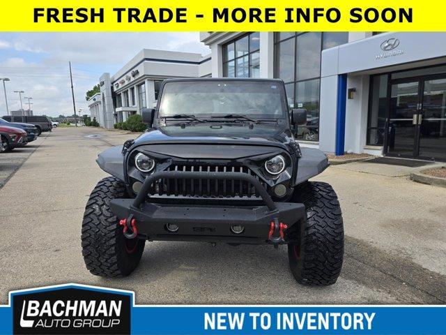 used 2013 Jeep Wrangler Unlimited car, priced at $16,500