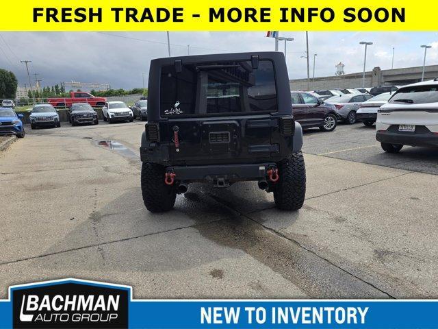 used 2013 Jeep Wrangler Unlimited car, priced at $16,500