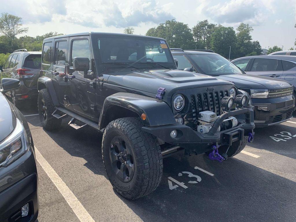 used 2015 Jeep Wrangler Unlimited car, priced at $22,189