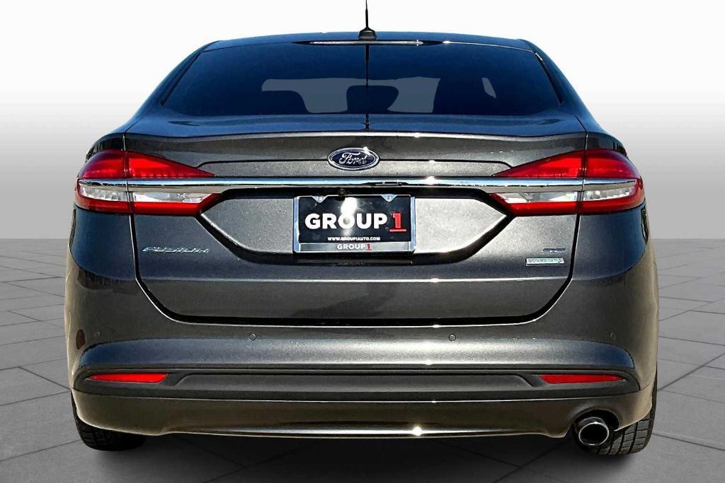 used 2018 Ford Fusion car, priced at $10,449