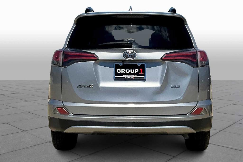 used 2018 Toyota RAV4 car, priced at $19,999