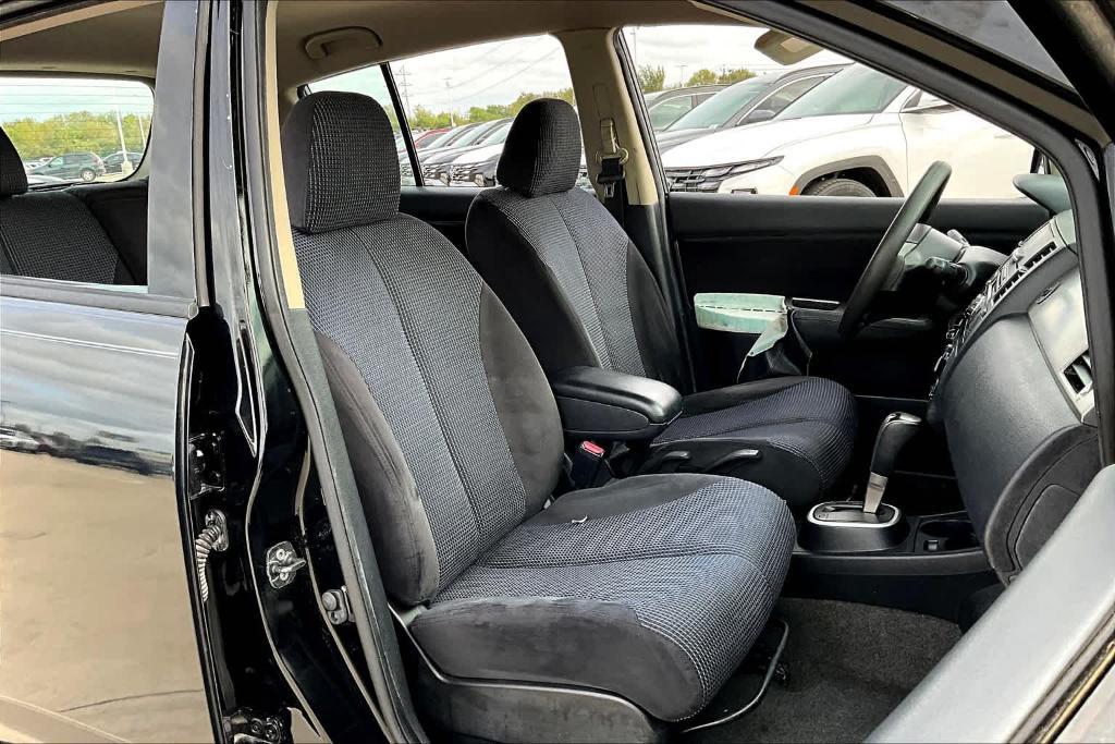 used 2011 Nissan Versa car, priced at $4,999