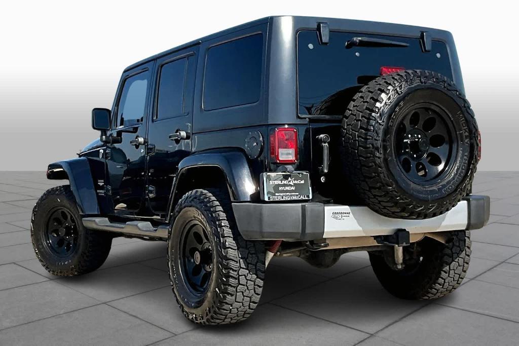 used 2015 Jeep Wrangler Unlimited car, priced at $15,661