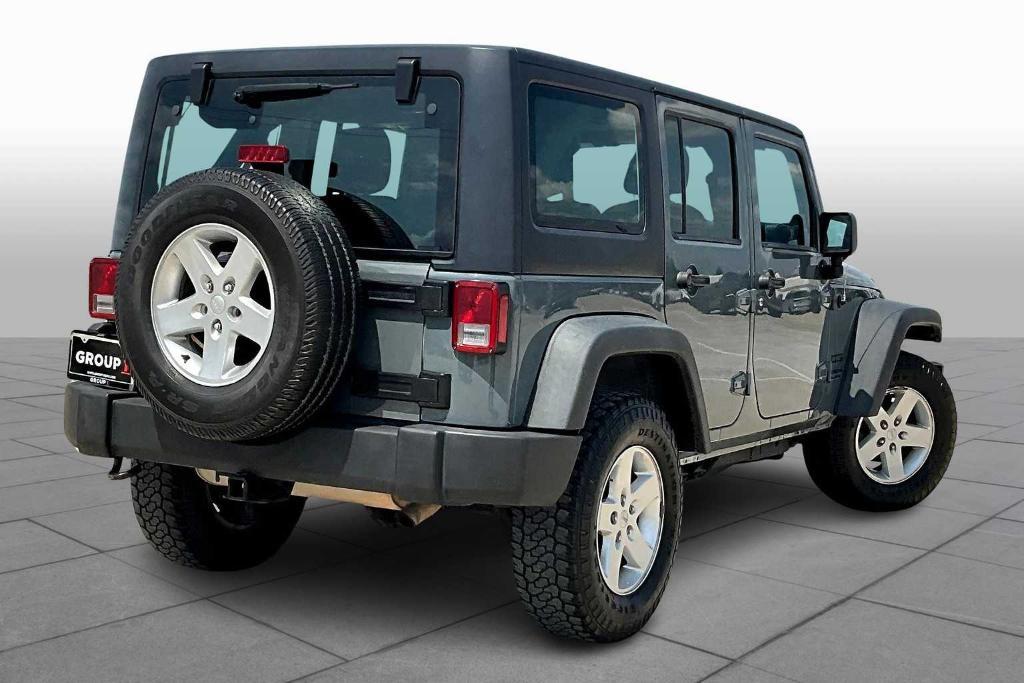 used 2014 Jeep Wrangler Unlimited car, priced at $15,806