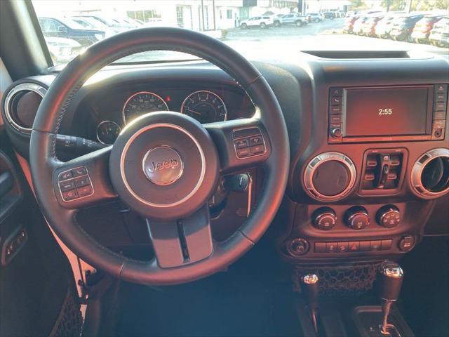 used 2015 Jeep Wrangler Unlimited car, priced at $20,537