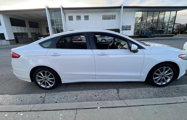 used 2017 Ford Fusion car, priced at $12,895