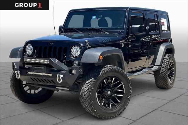 used 2018 Jeep Wrangler JK Unlimited car, priced at $27,000
