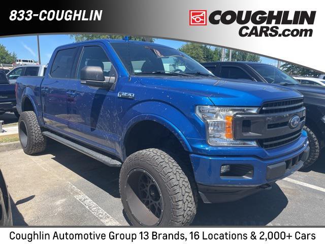 used 2018 Ford F-150 car, priced at $29,135