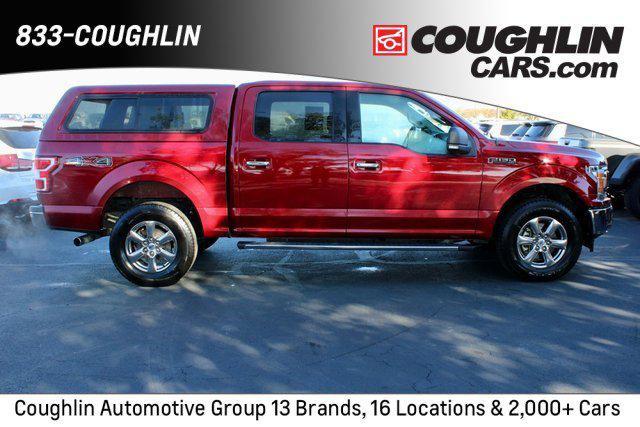 used 2019 Ford F-150 car, priced at $23,389