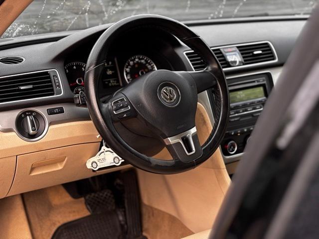 used 2014 Volkswagen Passat car, priced at $7,999