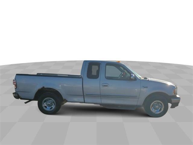 used 1999 Ford F-150 car, priced at $3,999