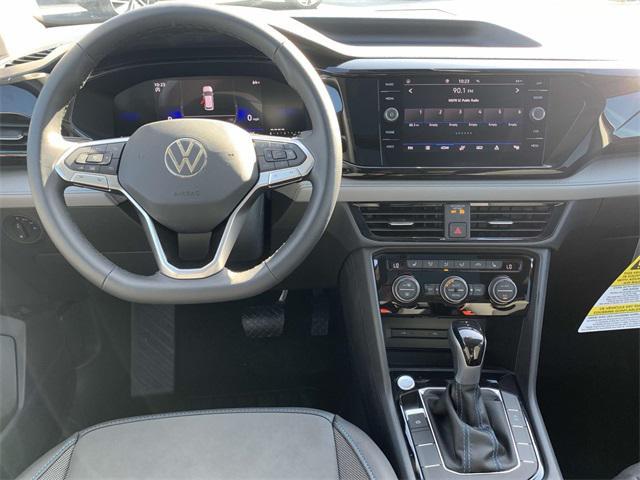 new 2024 Volkswagen Taos car, priced at $31,011