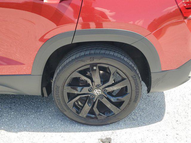 used 2022 Volkswagen Taos car, priced at $17,928