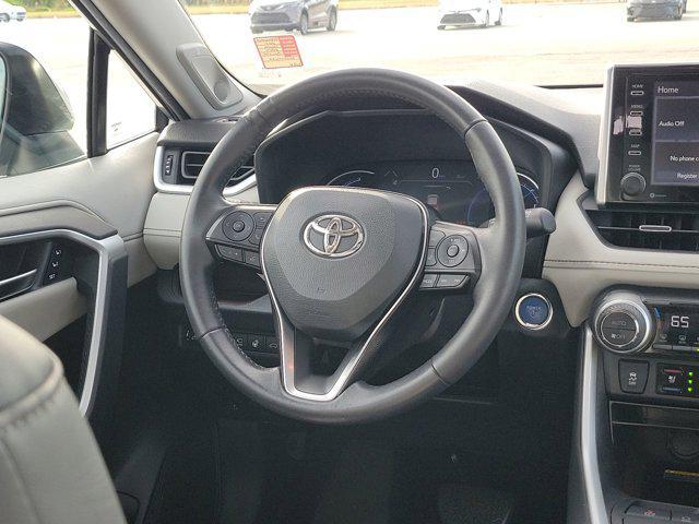 used 2021 Toyota RAV4 Hybrid car, priced at $30,370