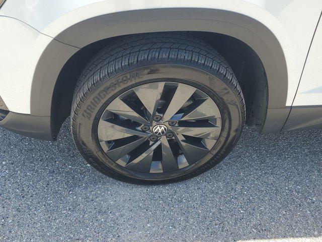 used 2024 Volkswagen Taos car, priced at $18,827