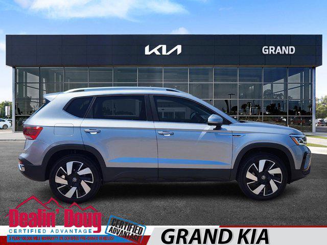 used 2024 Volkswagen Taos car, priced at $30,201