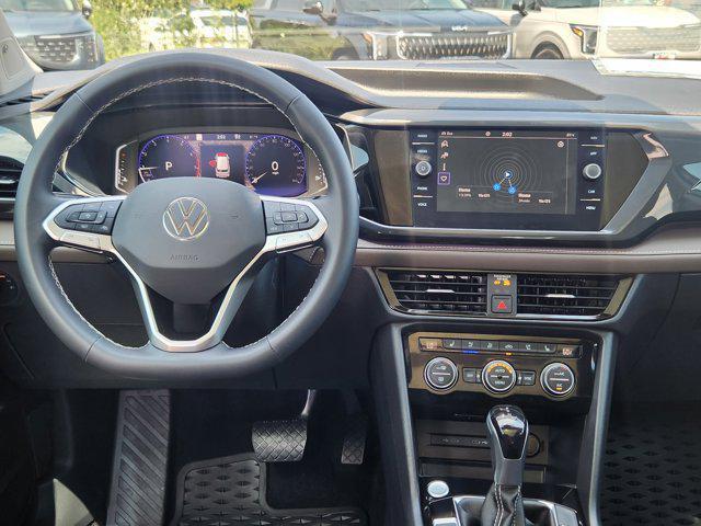 used 2024 Volkswagen Taos car, priced at $30,201