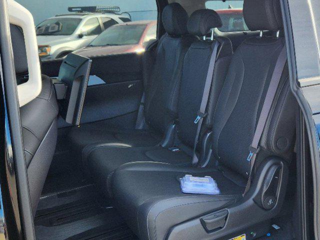new 2025 Kia Carnival Hybrid car, priced at $49,921
