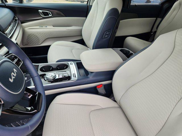 new 2025 Kia Carnival Hybrid car, priced at $54,073