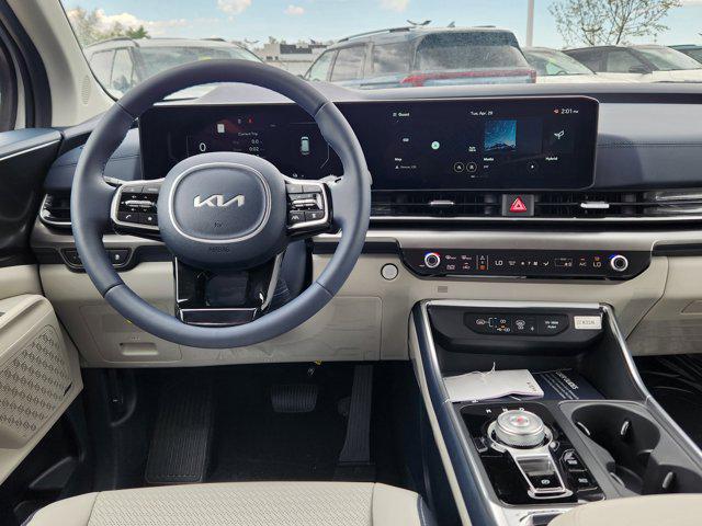 new 2025 Kia Carnival Hybrid car, priced at $54,073